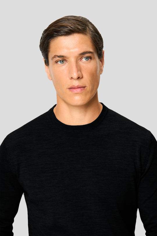 Sort merino crew neck